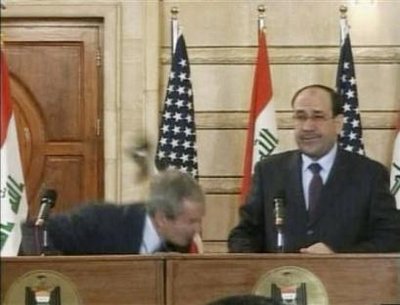 president-bush-gets-shoe-thrown-at-him.jpg