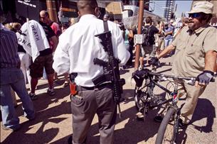 obama-protester-with-gun.jpg