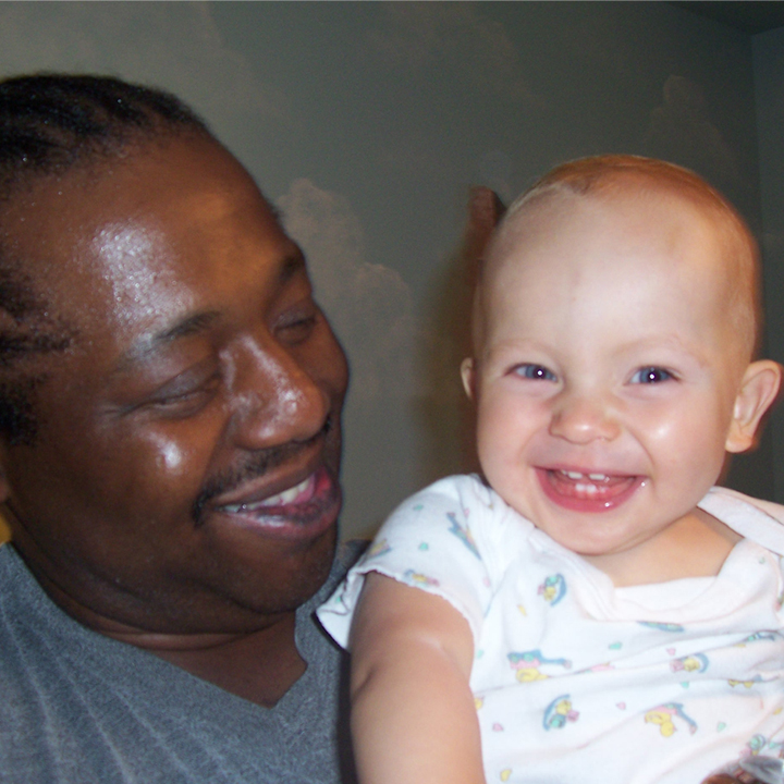 square-black-man-white-baby.jpg