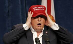 Trump idiot holding his head