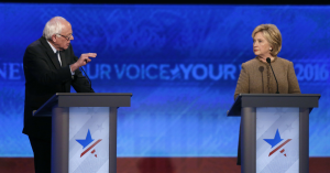 Sanders hits Clinton hard