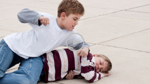 Bullying idiot punching kid